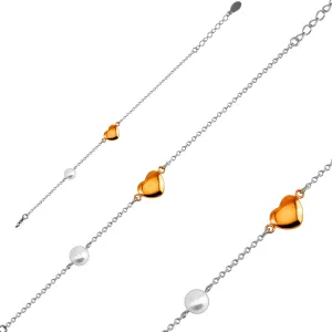 Čelična narukvica - glatko sjajno srce u zlatnoj boji, biserne perle, tanki lančić