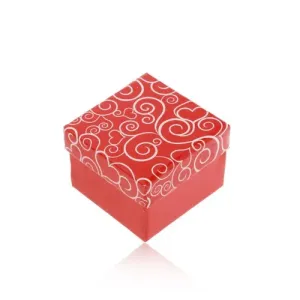 Poklon kutija u crvenoj boji, bijeli ornamenti u obliku srca