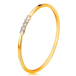 Prsten od 14 karatnog žutog zlata - linija prozirnih cirkona, tanki sjajni krakovi - Veličina: 49